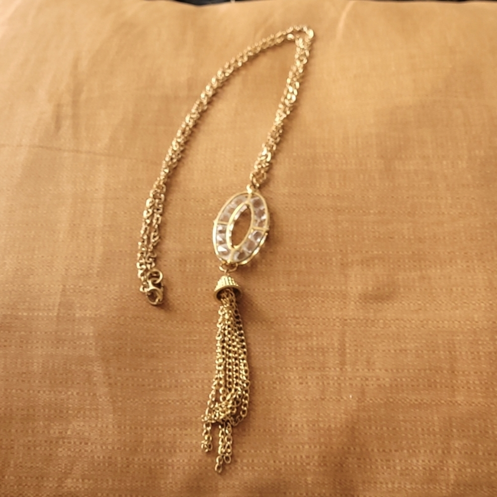24-inch chain with bling pendant. Faux gold.
